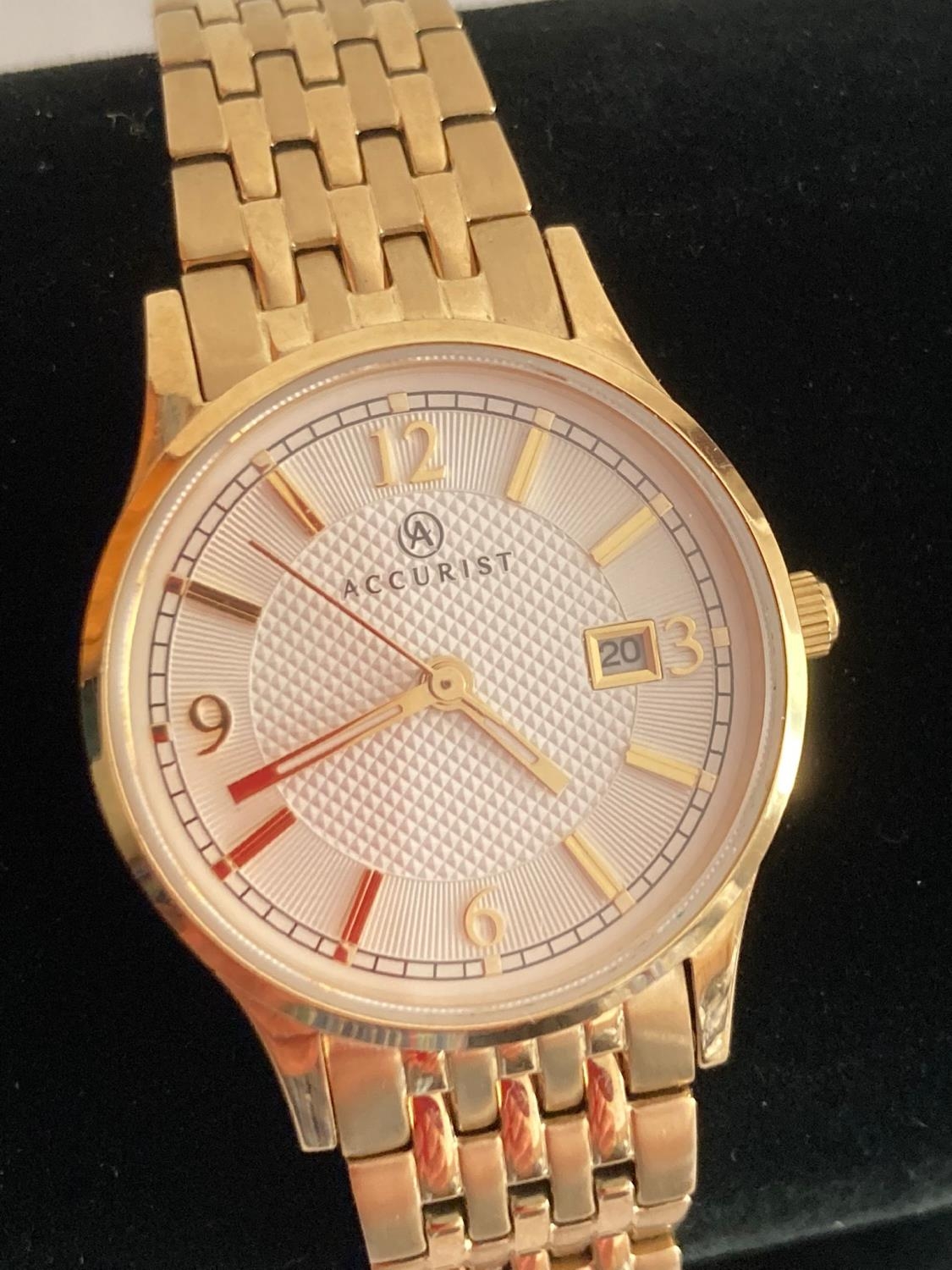 Ladies gold plated ACCURIST 8248 wristwatch , having Silver white dial with date window and sweeping