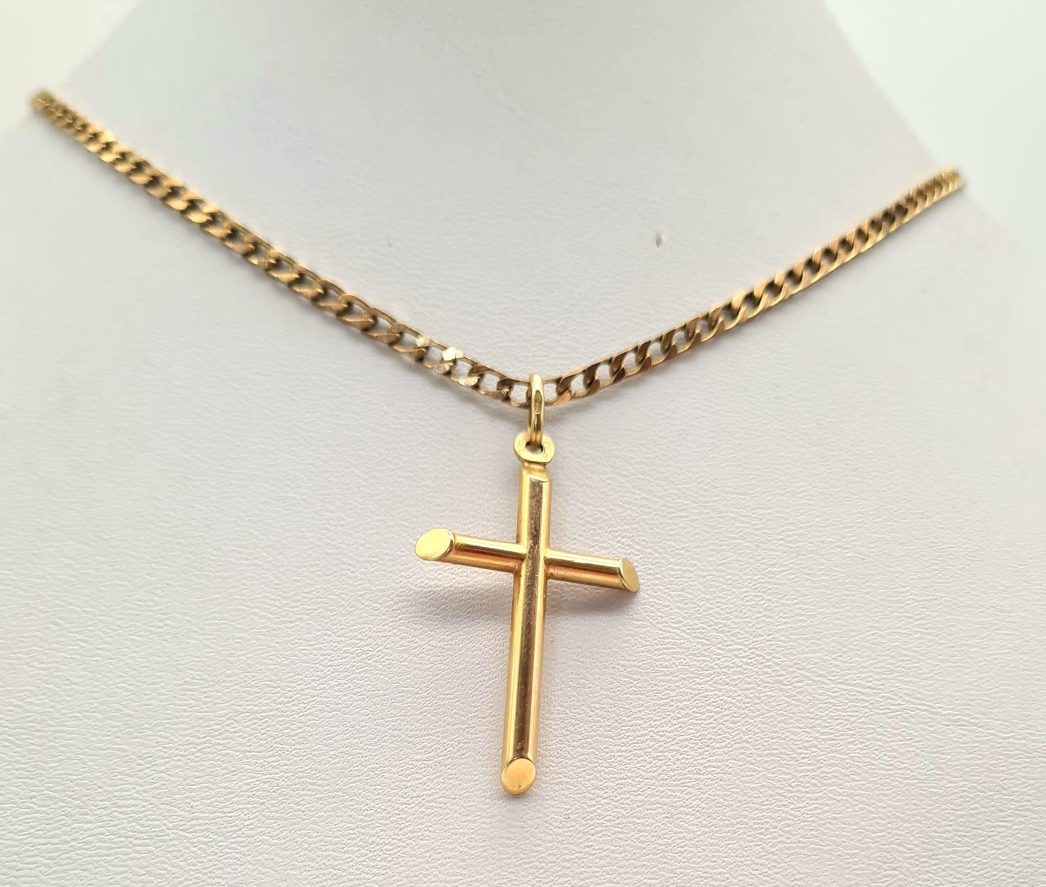 A 9K Yellow Gold Link Chain with Cross Pendant. 4 and 60cm. 11.05g total weight. Ref - 3287.