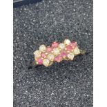 9 carat GOLD RING set with RUBIES and white Gemstones. Full UK hallmark. Complete with ring box. 1.8