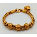 A 22K Yellow Gold Asian Wedding Bracelet with Heart Charm. 17cm. 30.3g. Ref - 7477.