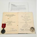 WW2 German Eastern Front Medal & Silver Wound Badge with Certificates Awarded to the same soldier.