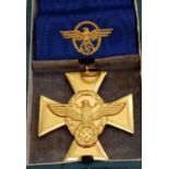 A German Reich's Police 25 Year Long Service Medal. This is a gilt cross depicting the German