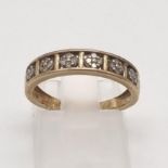 A 9K Yellow Gold Diamond Half-Eternity Ring. Six x four squares of small diamonds. Size L. 1.92g