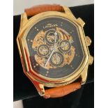Gentlemans LINHART AUTOMATIC SKELETON WRISTWATCH. Finished in gold tone having white hands on a