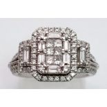 A Stunning Vera Wang 18K White Gold and Diamond Love Ring. Featuring a collage of diamond cuts -