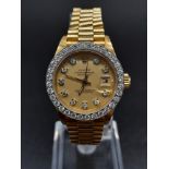 An 18K Gold and Diamond Rolex Oyster Perpetual Datejust Ladies Watch. 18k gold strap and case -