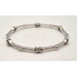 18K WHITE GOLD DIAMOND SET BANGLE 0.60CT 16.9G