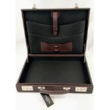 A Simpson of London Carbon Brown Leather Attaché Case. Unused, but some small signs of shop wear and