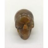 A Hand-Carved Tiger Jasper Crystal Skull Figure. Good as an eclectic ornament or small