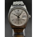 A Rolex Oyster Perpetual Datejust Gents Watch. Stainless steel strap and case - 35mm. Silver tone