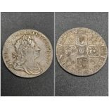 A 1723 George I Silver Shilling Coin. VF condition but please see photos.