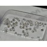 A Parcel of Loose Round Brilliant and Princess Cut Natural Diamonds. Total diamond weight. 1.01ct.