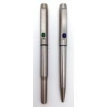 A Pair of Vintage Parker 25 Pens. A fountain pen with green upper and a blue enamel decorated