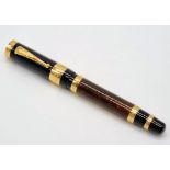 A Mont Blanc Limited Edition Francois Fountain Pen. Black resin and gold plate cap. Brown resin