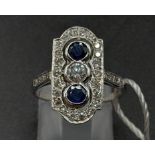 A 950 Platinum Sapphire and Diamond W.G.I Certified Art Deco Ring. A platinum ring with 31 round