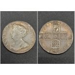 A 1711c Queen Anne Shilling Silver Coin. 3rd bust. GF condition. Please see photos.