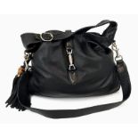 A Gucci Jackie Leather Shoulder Bag. Soft deerskin with gilded hardware. Spacious interior. 40 x