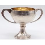 A Vintage Solid Silver Football Trophy. Hallmarks for Birmingham. 166g. 13cm tall.
