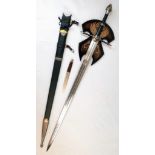 The Very Collectible Lord of The Rings Sword of Strider with Scabbard. Solid metal cross guard and