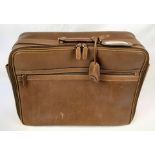 A Gucci Hand Luggage Case. Brown leather with shoulder strap. In good condition but please see