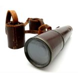 An Antique Three Draw Brass Telescope. Leather bound. 87cm fully extended. Good condition but a/f.