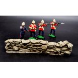 A Vintage Set of Four British Zulu War Lead Soldiers with a Sandbag Wall.