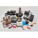 A Brilliant Collection of Vintage Cameras. Including 35mm, instant, movie. Plus extra lenses and