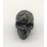 A Hand Carved Spectrolite Crystal Skull Figure. An eclectic ornament or small paper weight. 5 x 4cm.