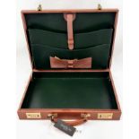A Simpson of London Brown Leather Attaché Case. Unused, but small signs of shop wear and tear so
