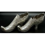 An early Victorian pair of white metal shoes. Total weight: 706 grams. 19cm length. 10cm tall.