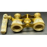 A brass and Mother of Pearl opera Binoculars with extendable handle in a wooden box. Excellent