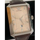Gentlemans Emporio ARMANI model AR 0456 wristwatch.Large square golden face with sweeping second