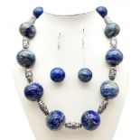 A very desirable, Tibetan silver necklace and earrings set with large (up to 24 mm) lapis lazuli