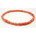 A Vintage Natural Red Coral Barrel Beaded Necklace. A wonderful example piece of coral in its