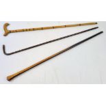 Three Antique 1920s Bamboo and Cherry Wood Walking Sticks/Canes. In good condition but one is