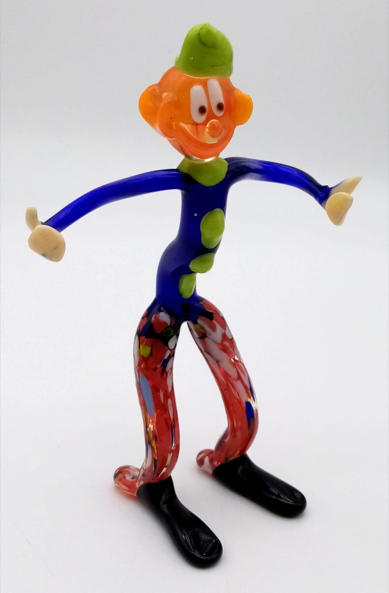 A vintage, artisan’s creation, a multicoloured clown, made with glass in the Murano factory, Venice,