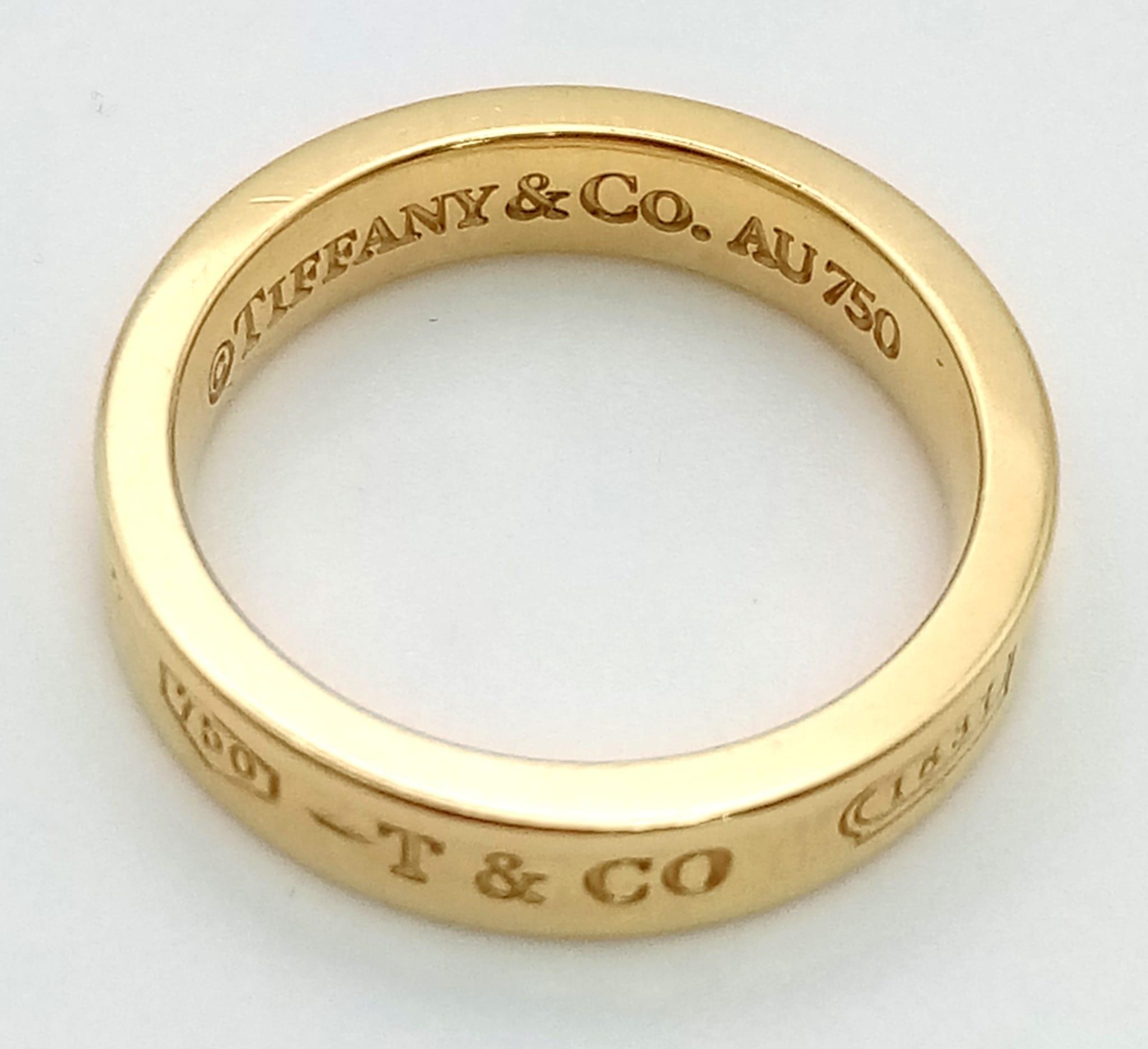 An 18 K yellow gold TIFFANY & CO band ring, size: K, weight: 6.2 g. - Image 3 of 3