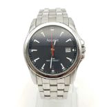 An Accurist Gents Black Dial Watch. Stainless steel strap and case - 40mm. In good condition and