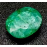 A 8.85ct Green Beryl (Composite). Oval cut. Comes with a certificate.