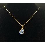 A Breath-Taking 18K Yellow Gold Blue Topaz Pendant on an 18K Gold Snake-Link Necklace. Topaz -