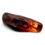 A Natural Piece of Dark Amber. Microscopic flora and insects encapsulated. 4cm