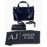 An Armani Jeans Patent Blue Handbag and Matching Purse. Comes with a shoulder strap. Monogrammed
