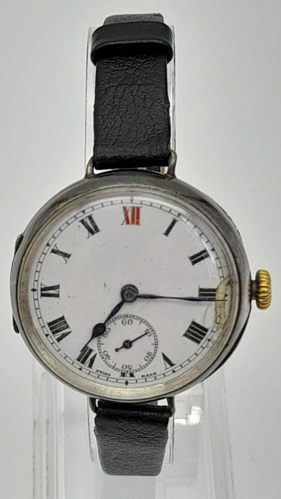 A Vintage Silver Cased B and Co Swiss Watch. Mechanical movement in working order.