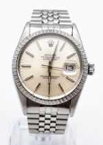 A Rolex Oyster Perpetual Datejust Gents Watch. Stainless steel strap and case - 36mm. Silver tone