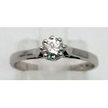 A 9 K white gold diamond (0.23 carats) solitaire ring. Size: M, weight: 1.5 g.