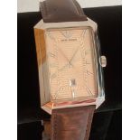 Gentlemans ARMANI quartz wristwatch with the ARMANI Signature design large square lined face with