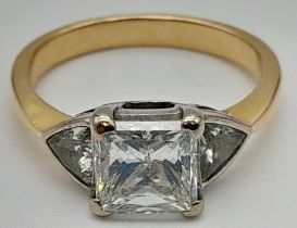 An 18K Yellow Gold Diamond Solitaire Ring. Excellent quality princess cut 2ct centre stone flanked