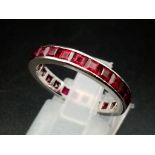 Fully channel eternity ring with square cut rubies captured forever in platinum, ring size O,