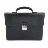 A Louis Vuitton Black Document Briefcase. Zip pocket and folder pocket interior. In very good