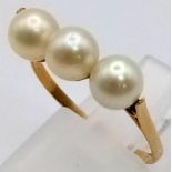 A High K Gold (tested) Three Pearl Ring. Size P. 2g total weight.